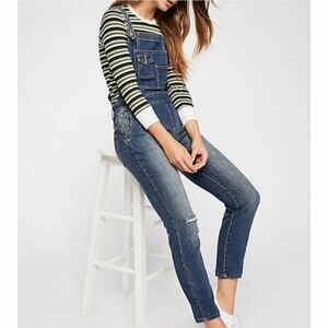 Free People distressed denim overall size 26